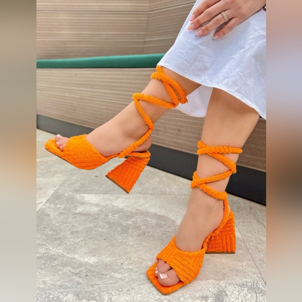 Orange strap up heels NWOT